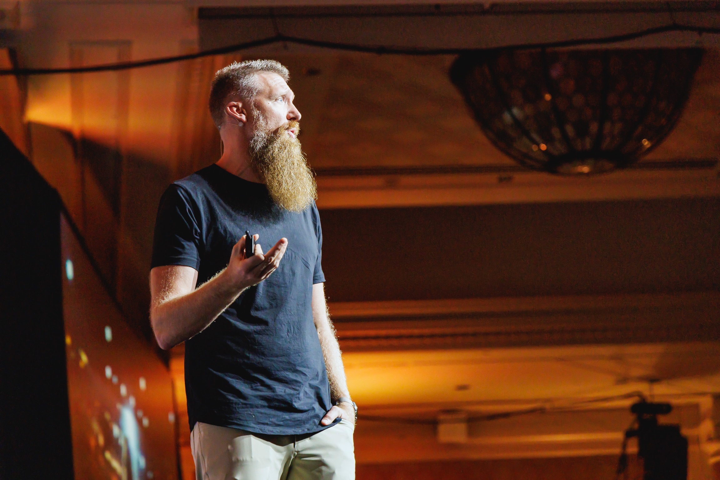 Brandon Turner speaking to a room of investors